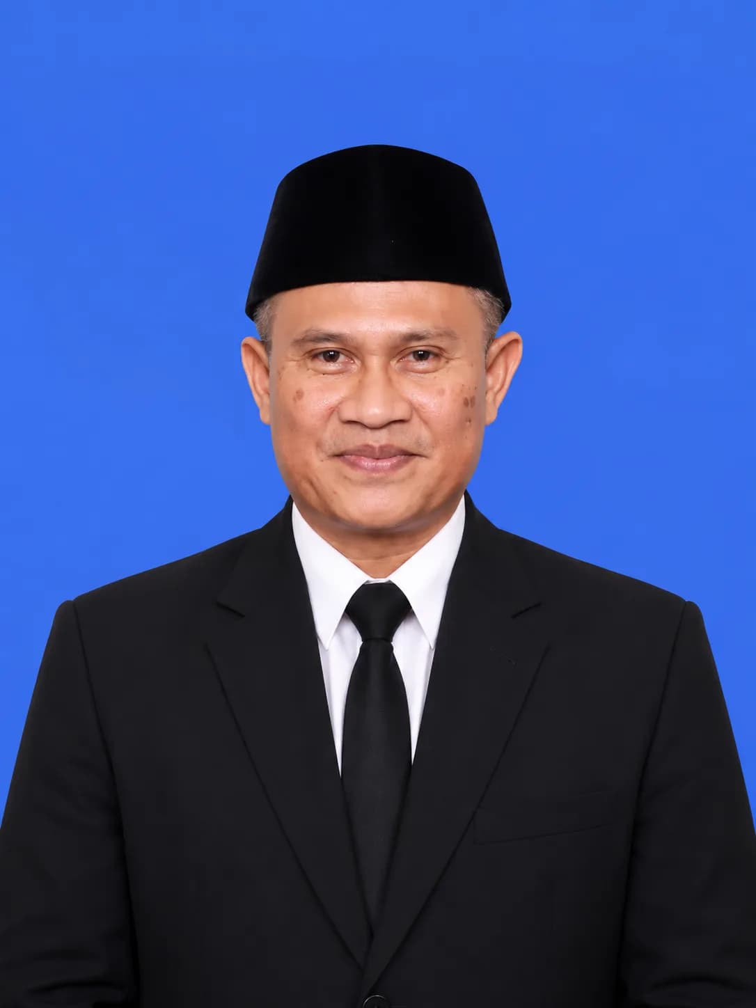 Potret resmi Dr. Masykur, M.Hum